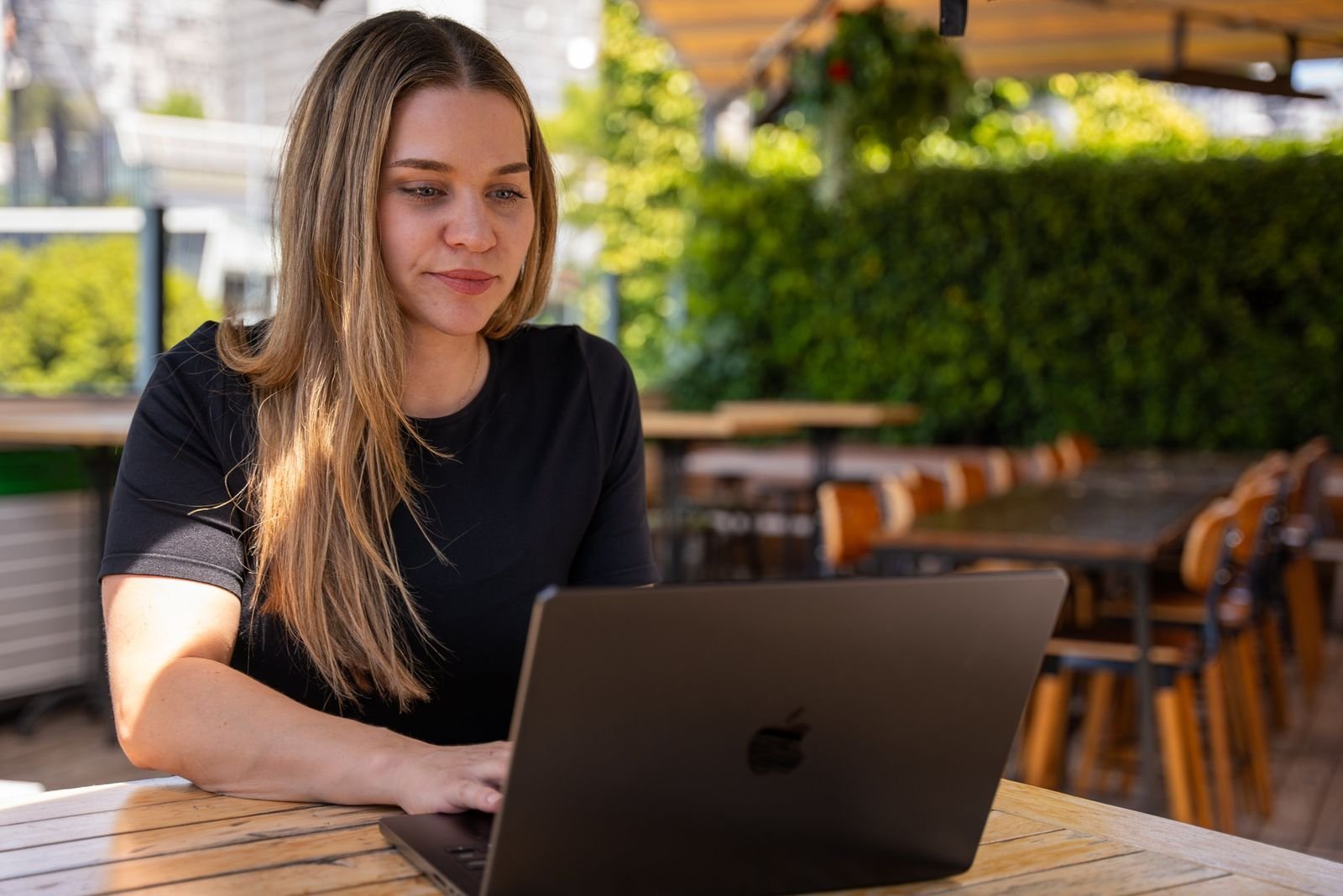 Mylène Chevrier working on her laptop
